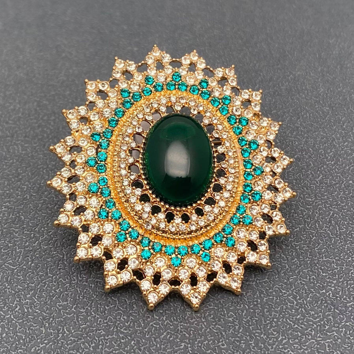 The Grand Emerald-Green Brooch