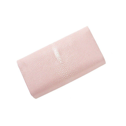 Pink textured clutch bag on a white background