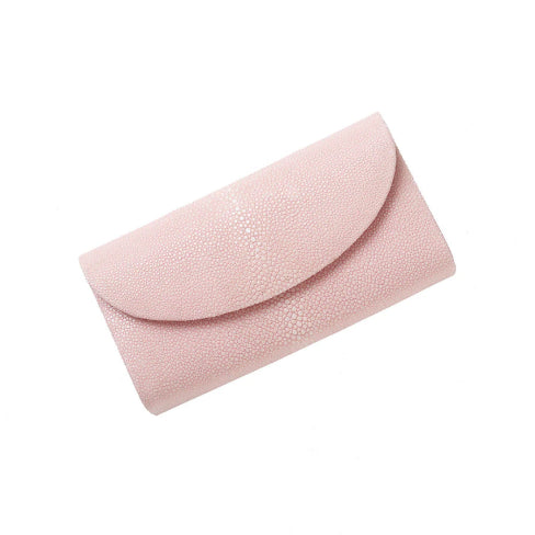 Pink clutch bag on a white background