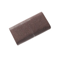 Brown textured clutch bag on a white background