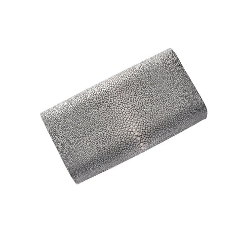 Rectangular clutch bag with a textured surface on a white background