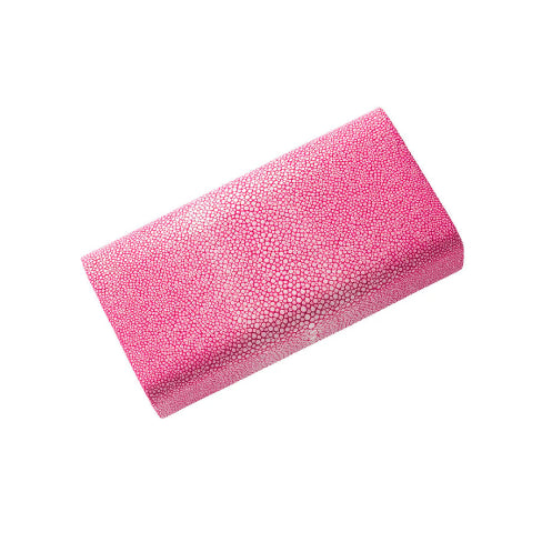 Pink textured clutch bag on a white background