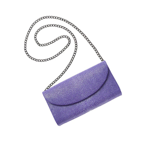 Purple clutch bag with chain strap on a white background