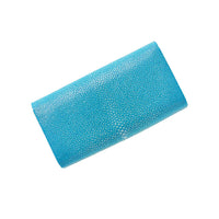 Blue textured clutch bag on a white background