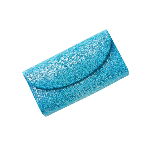 Blue textured clutch bag on a white background